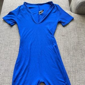 This a blue body suit in the brand “JNK”!